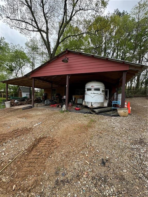 view of car parking with a carport