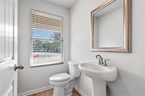 empty room featuring baseboards, carpet floors, attic access, and recessed lighting