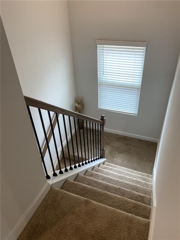 bedroom with recessed lighting, baseboards, and wood finished floors