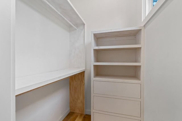 4366 Skyland Dr NE, Atlanta, GA 30342 - walk in closet with light wood finished floors