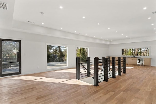 4366 Skyland Dr NE, Atlanta, GA 30342 - interior space with recessed lighting, beverage cooler, visible vents, and wood finished floors