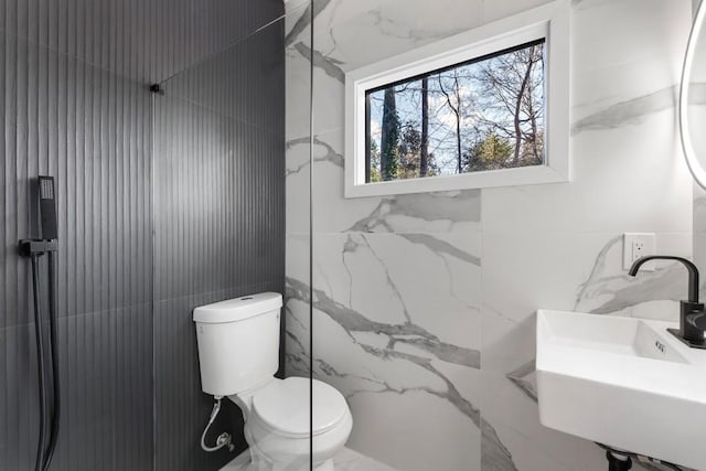 4366 Skyland Dr NE, Atlanta, GA 30342 - bathroom featuring tile walls, toilet, a marble finish shower, and a sink