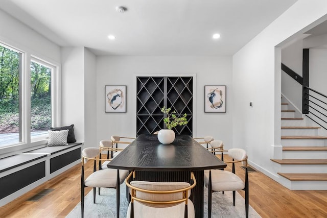 4366 Skyland Dr NE, Atlanta, GA 30342 - dining room with visible vents, stairs, light wood finished floors, and recessed lighting