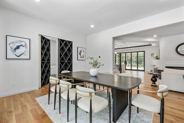 4366 Skyland Dr NE, Atlanta, GA 30342 - dining area with stairs, baseboards, recessed lighting, and light wood-style floors