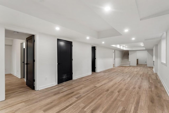 4366 Skyland Dr NE, Atlanta, GA 30342 - finished basement with recessed lighting, light wood-style floors, baseboards, and stairs