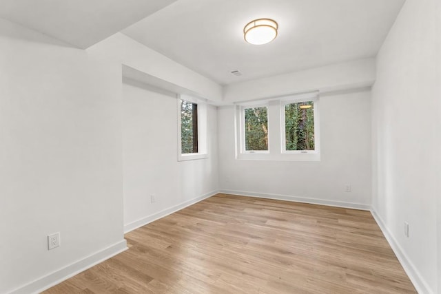 4366 Skyland Dr NE, Atlanta, GA 30342 - spare room featuring light wood-style flooring and baseboards