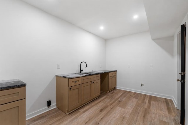 4366 Skyland Dr NE, Atlanta, GA 30342 - clothes washing area featuring recessed lighting, baseboards, a sink, and light wood-style floors