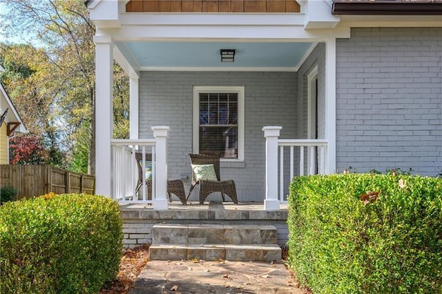 doorway to property featuring a porch