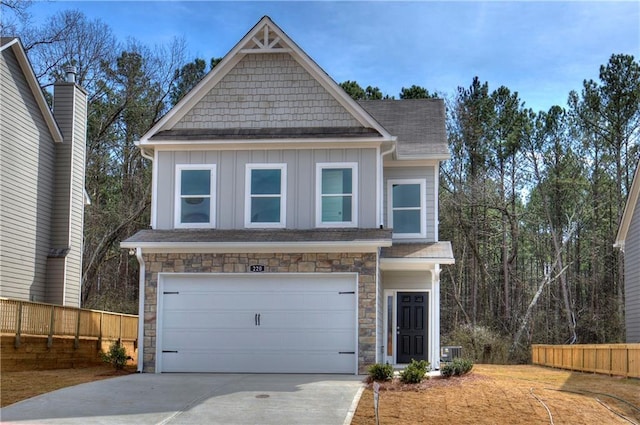 craftsman-style house featuring a garage