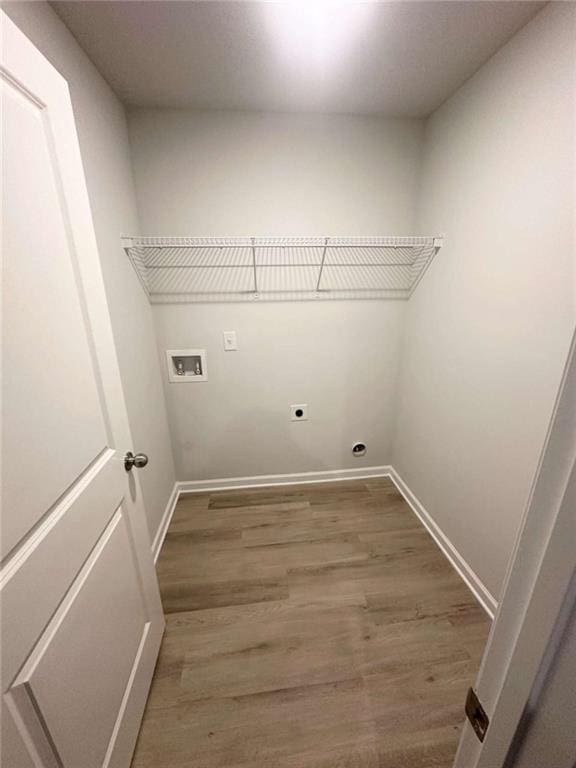 119 Deer Xing, Temple, GA 30179 - washroom featuring hookup for a washing machine, electric dryer hookup, and wood finished floors