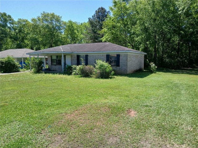 106 Gray St, Atmore, AL 36502 - single story home featuring a front yard