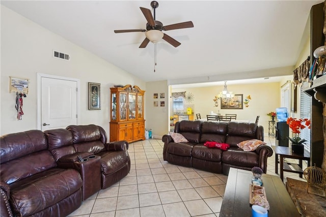 living room with light tile patterned floors, ceiling fan with notable chandelier, lofted ceiling, and visible vents