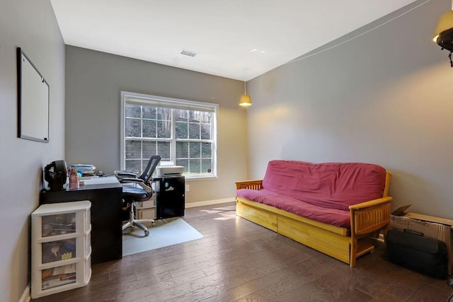 office with visible vents, wood-type flooring, and baseboards