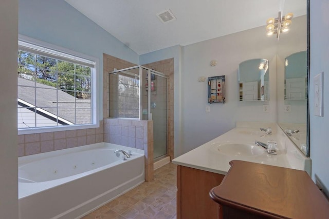 bathroom with a sink, visible vents, a tub with jets, and a shower stall