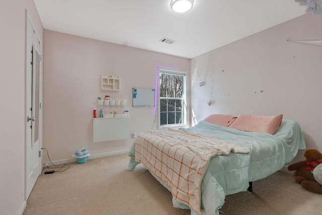 bedroom featuring carpet flooring, baseboards, and visible vents