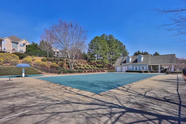 pool with a patio