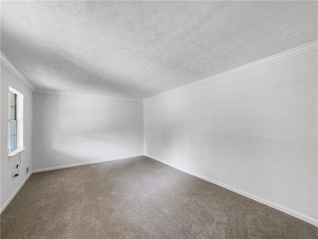 carpeted empty room with a textured ceiling and ornamental molding