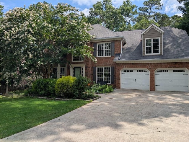 5882 Grandview Ct NW, Acworth, GA 30101 - view of front of house featuring concrete driveway, a front lawn, brick siding, a garage, and a shingled roof