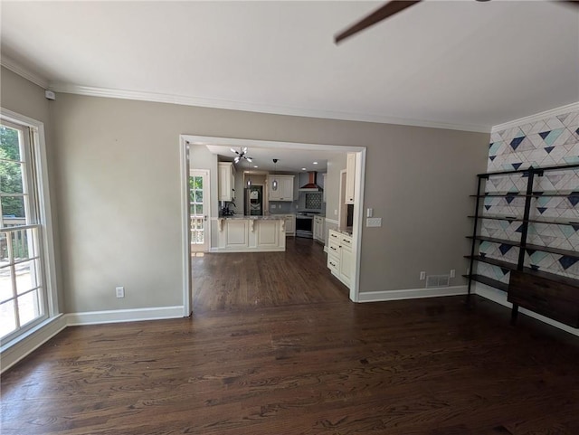 5882 Grandview Ct NW, Acworth, GA 30101 - unfurnished living room with ornamental molding and dark wood finished floors