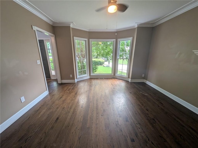 5882 Grandview Ct NW, Acworth, GA 30101 - spare room with ceiling fan, healthy amount of natural light, dark wood-type flooring, and crown molding