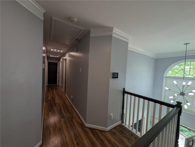 5882 Grandview Ct NW, Acworth, GA 30101 - corridor with attic access, dark wood-style floors, a chandelier, an upstairs landing, and crown molding