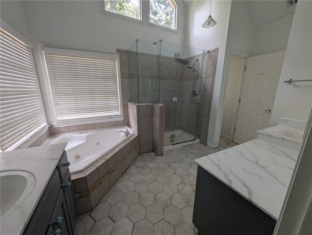 5882 Grandview Ct NW, Acworth, GA 30101 - bathroom featuring vanity, a shower stall, tile patterned floors, and a jetted tub