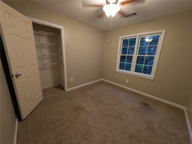 5882 Grandview Ct NW, Acworth, GA 30101 - unfurnished bedroom featuring carpet floors, a closet, and ceiling fan
