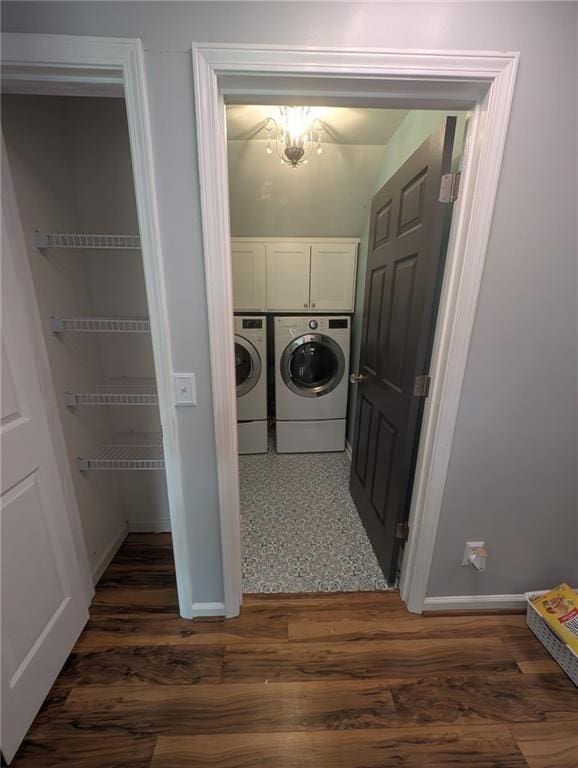 5882 Grandview Ct NW, Acworth, GA 30101 - laundry room with cabinet space, independent washer and dryer, and dark wood-type flooring