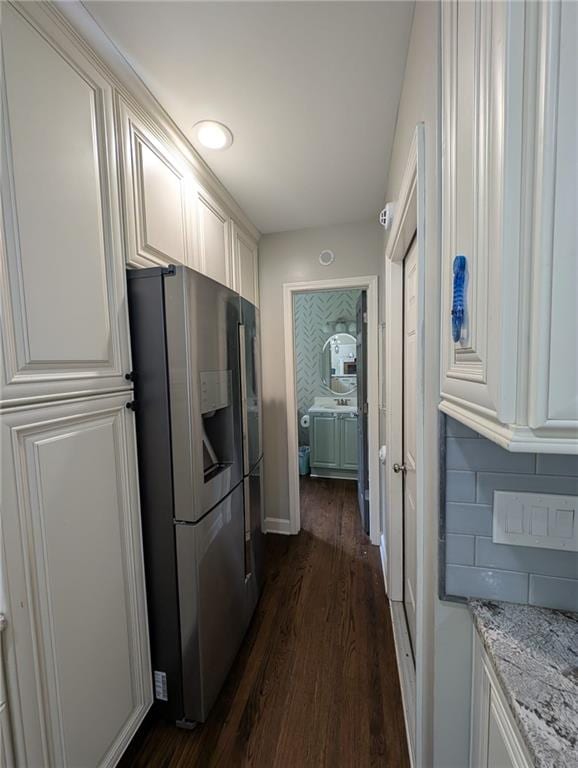5882 Grandview Ct NW, Acworth, GA 30101 - kitchen featuring stainless steel refrigerator with ice dispenser, dark wood-style flooring, light stone counters, and white cabinets