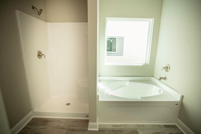 bathroom with independent shower and bath