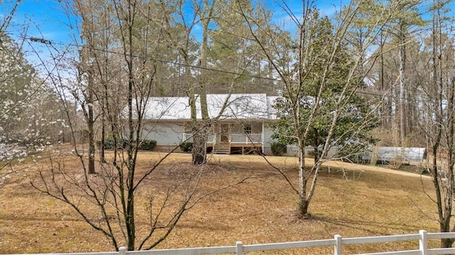 single story home with fence