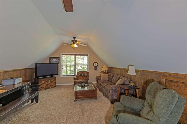 living room featuring carpet, lofted ceiling, and ceiling fan