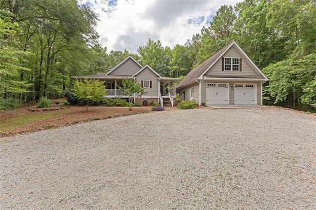 view of front of house featuring a garage and covered porch