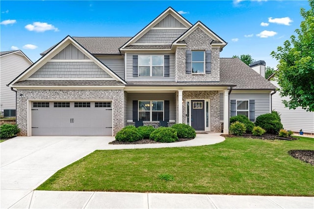 348 Meeler Cir, Bogart, GA 30622 - craftsman inspired home featuring a front yard, a porch, concrete driveway, brick siding, and roof with shingles
