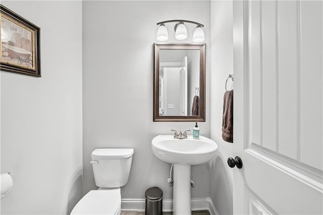 348 Meeler Cir, Bogart, GA 30622 - half bathroom with toilet and baseboards