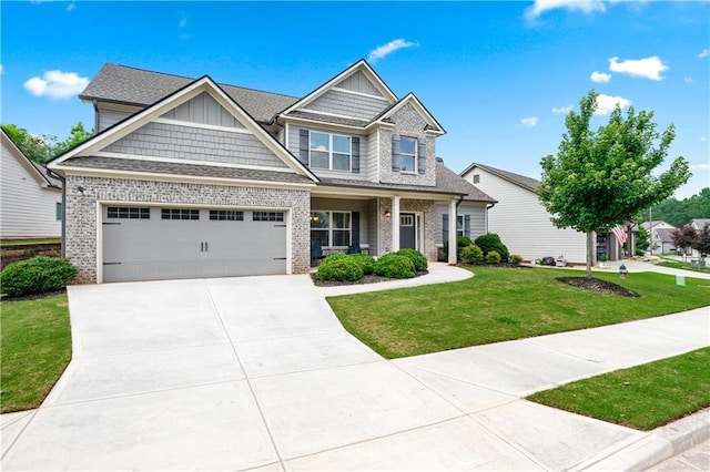 348 Meeler Cir, Bogart, GA 30622 - craftsman inspired home with a front yard, brick siding, driveway, and board and batten siding