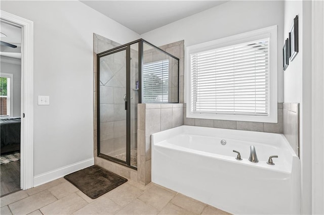 348 Meeler Cir, Bogart, GA 30622 - ensuite bathroom with a garden tub, a shower stall, and tile patterned floors