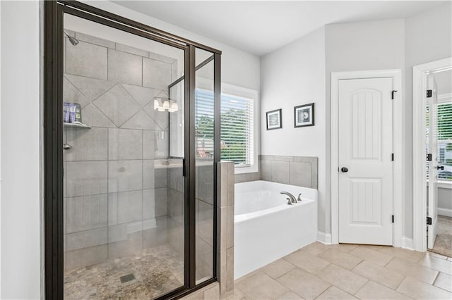 348 Meeler Cir, Bogart, GA 30622 - bathroom with a garden tub, a shower stall, and healthy amount of natural light