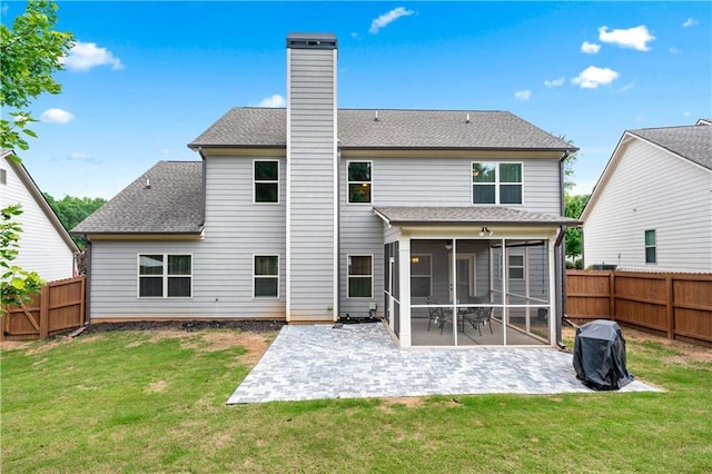 348 Meeler Cir, Bogart, GA 30622 - rear view of house with a sunroom, a patio, and a fenced backyard