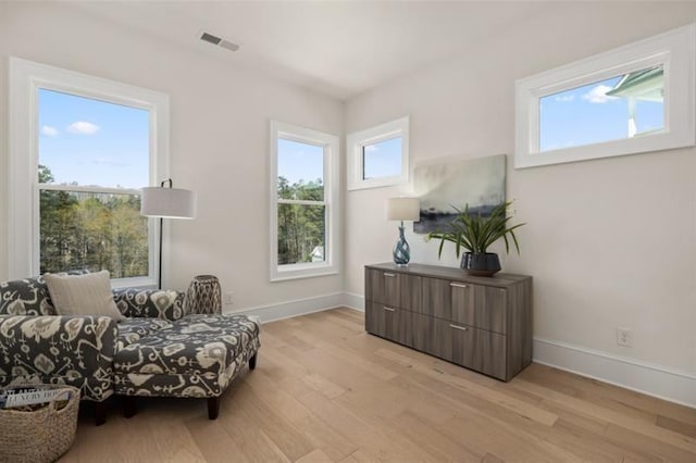 5247 Flannery Chase SW, Powder Springs, GA 30127 - living area featuring baseboards and light wood-type flooring