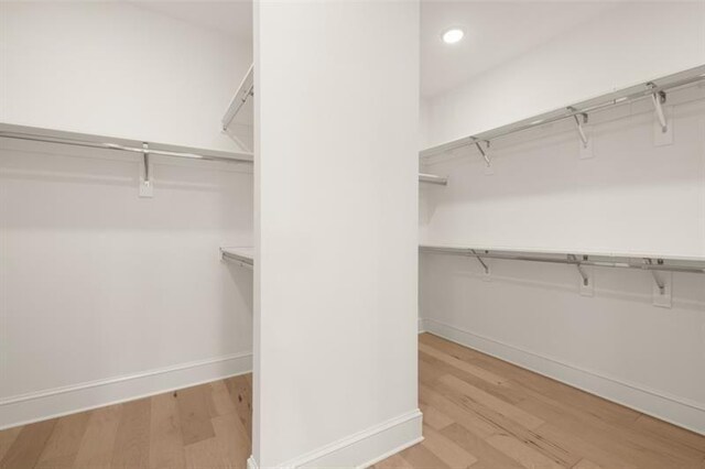 5247 Flannery Chase SW, Powder Springs, GA 30127 - spacious closet featuring light wood-style flooring