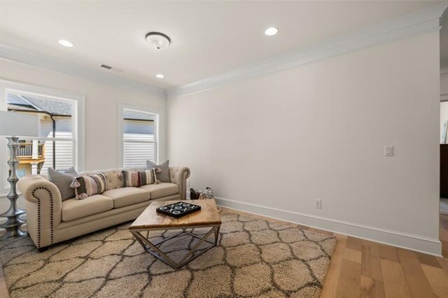5247 Flannery Chase SW, Powder Springs, GA 30127 - living area with wood finished floors, baseboards, ornamental molding, and recessed lighting