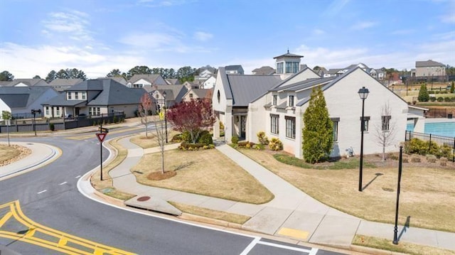 5247 Flannery Chase SW, Powder Springs, GA 30127 - view of asphalt street featuring sidewalks, a residential view, street lighting, and curbs