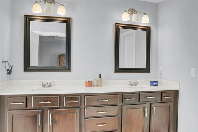 bathroom with double vanity and a sink