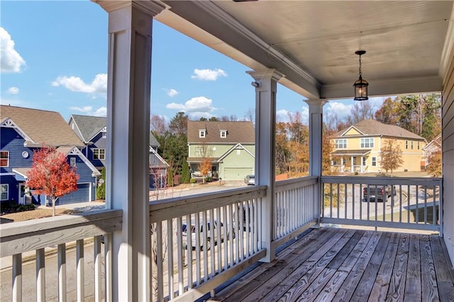 wooden terrace featuring a residential view