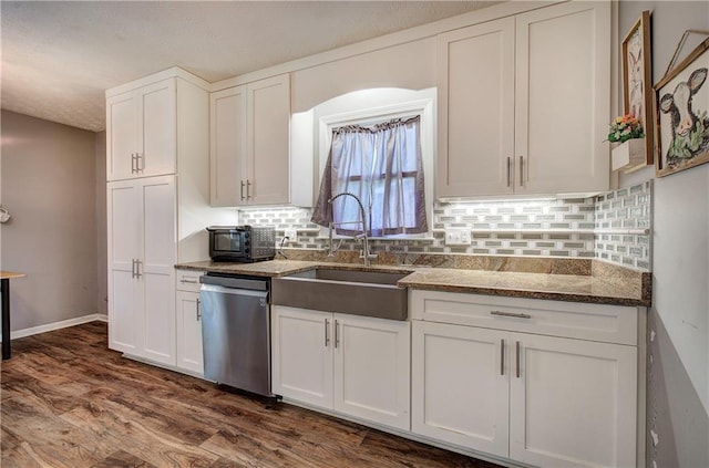 36 Skyview Cir, Cartersville, GA 30120 - kitchen with dishwasher, a sink, white cabinetry, dark stone counters, and a textured ceiling