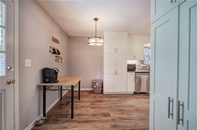 36 Skyview Cir, Cartersville, GA 30120 - kitchen featuring dishwasher, wood finished floors, white cabinets, and tasteful backsplash