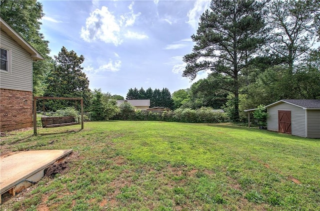 36 Skyview Cir, Cartersville, GA 30120 - view of grassy yard with a storage shed and an outbuilding
