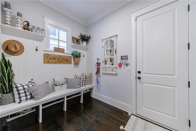 mudroom with dark wood-type flooring and ornamental molding