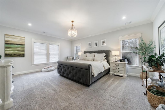 carpeted bedroom with an inviting chandelier, multiple windows, and ornamental molding